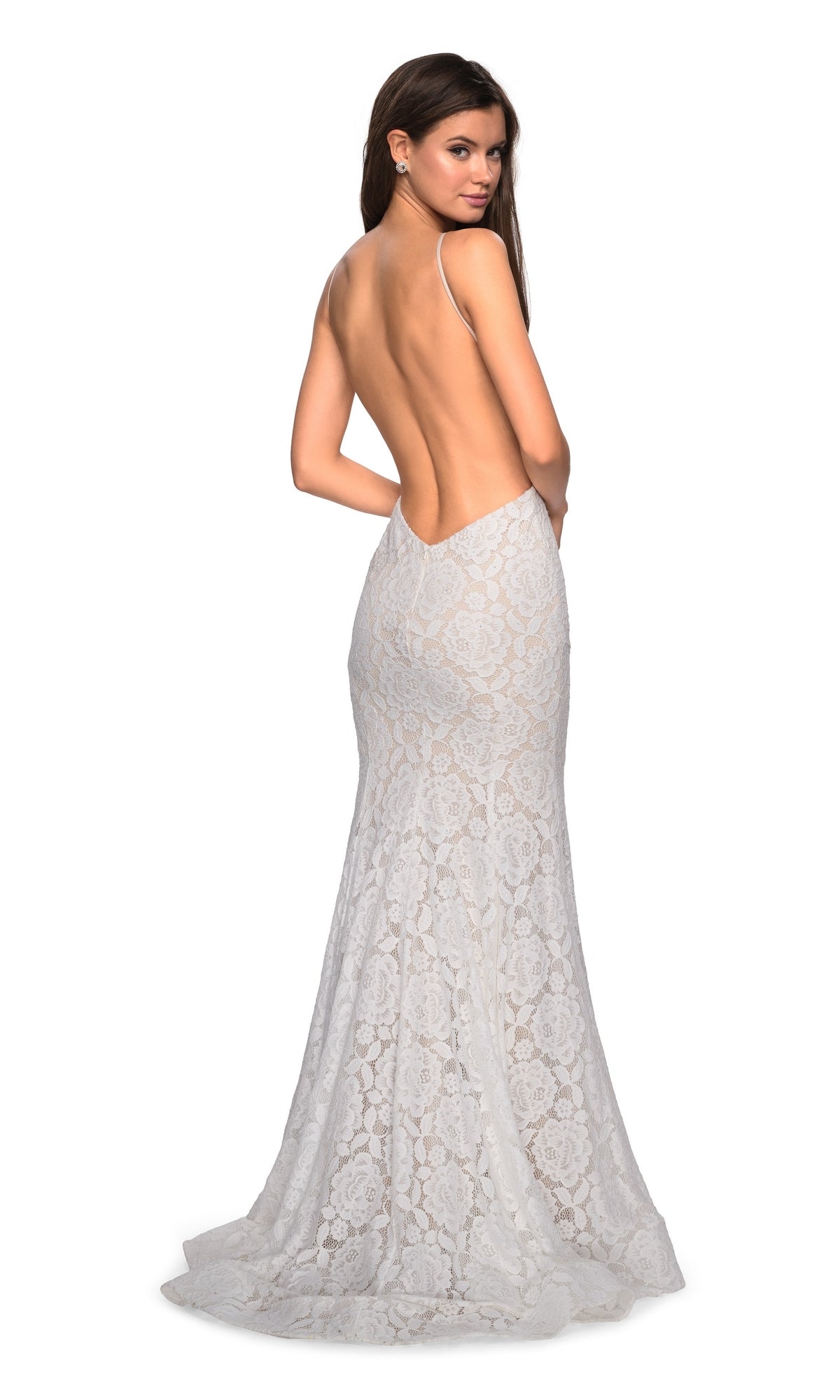 A woman models the La Femme Floral Lace Mermaid Prom Dress 27289, featuring a floor-length mermaid silhouette, high neckline, floral lace details, and an open low V-back, as she looks over her shoulder against a plain background.